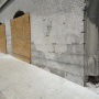 Removal of existing stucco to expose stonework & arches